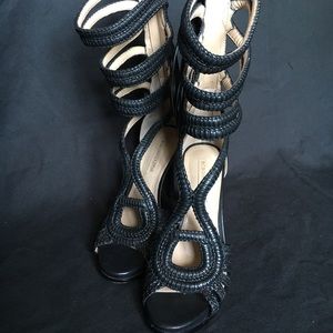BCBGMAXAZRIA braided leather gladiator sandal.